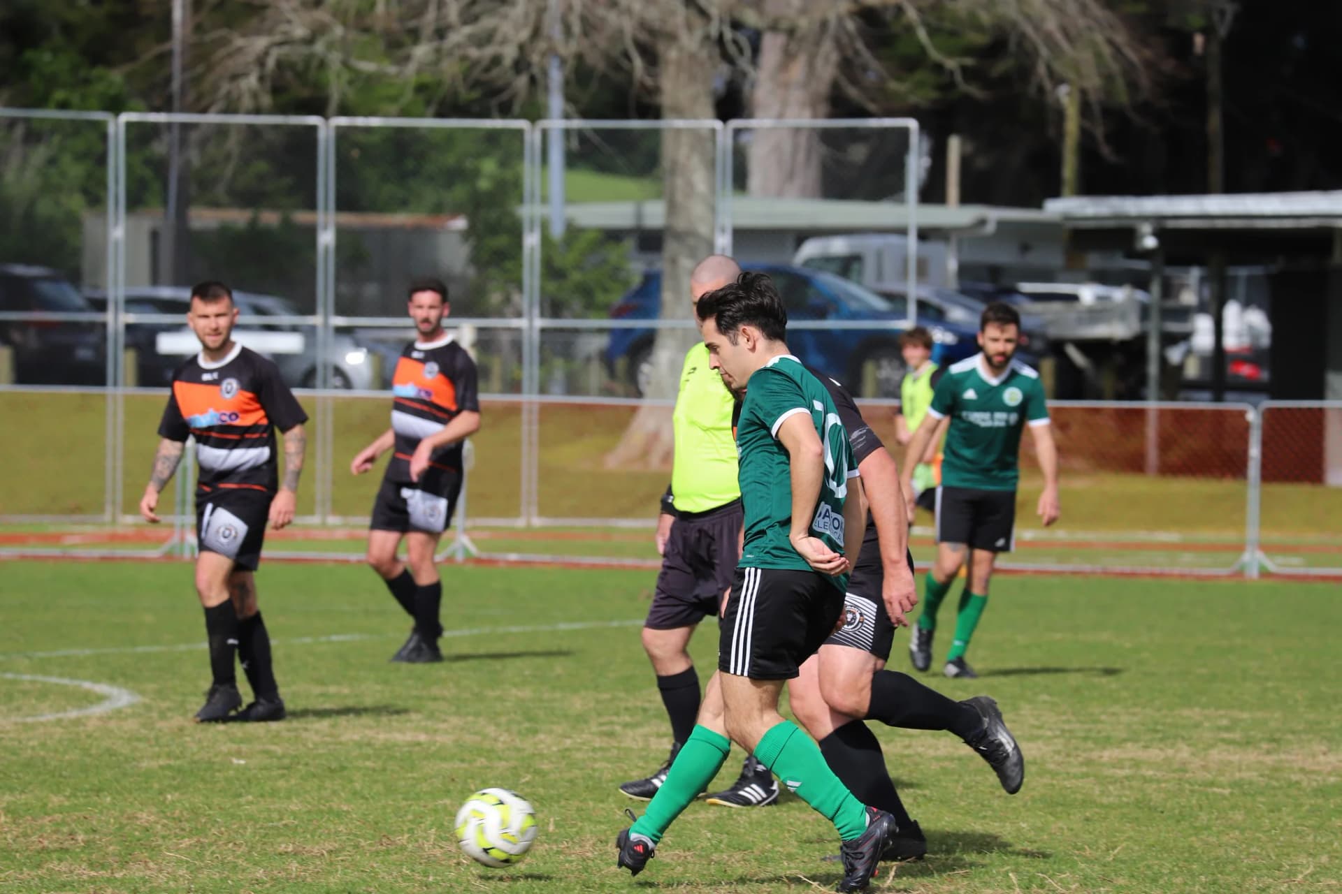 Player dribbling past a defender