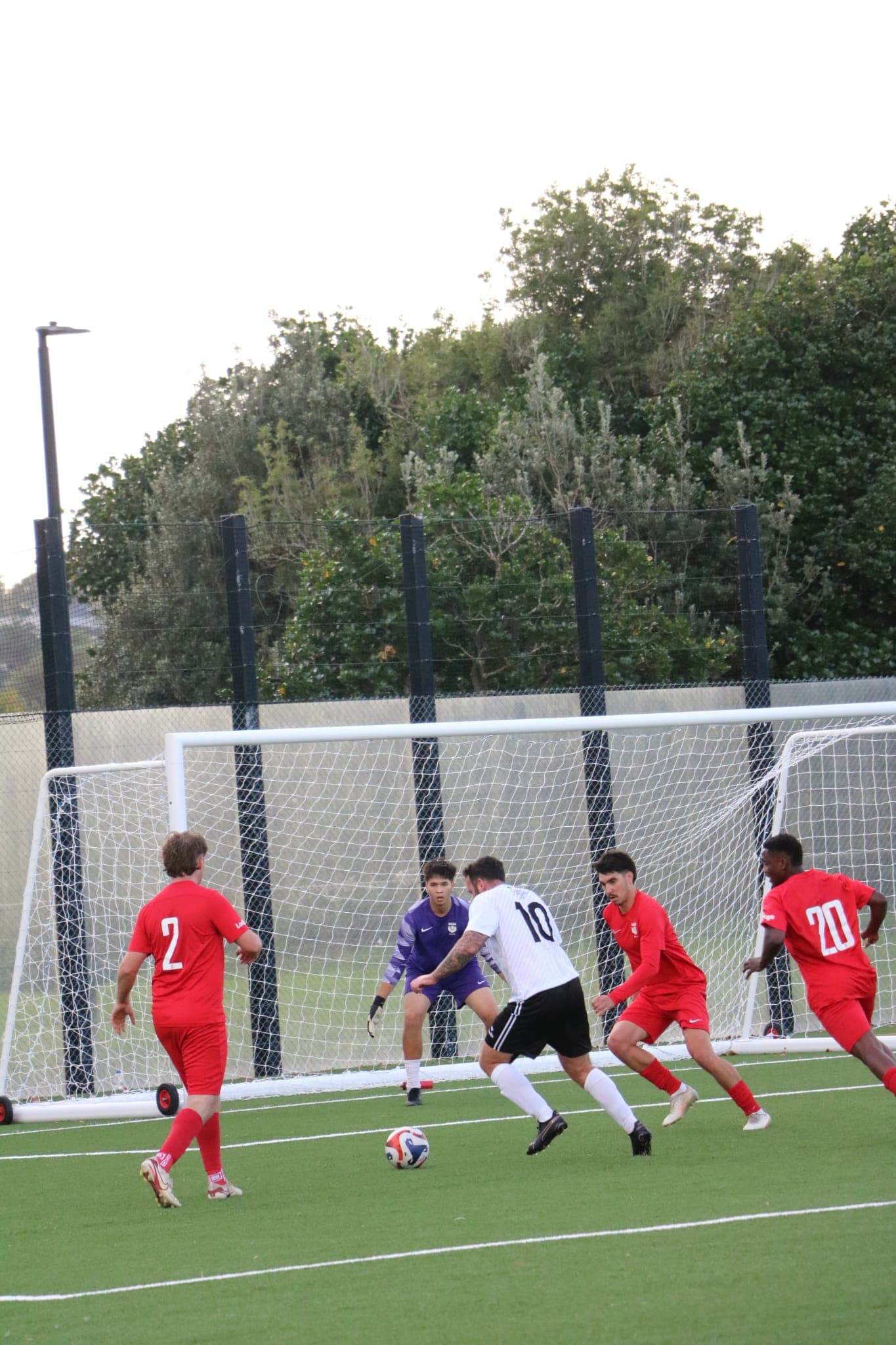 Number 10 passing the ball