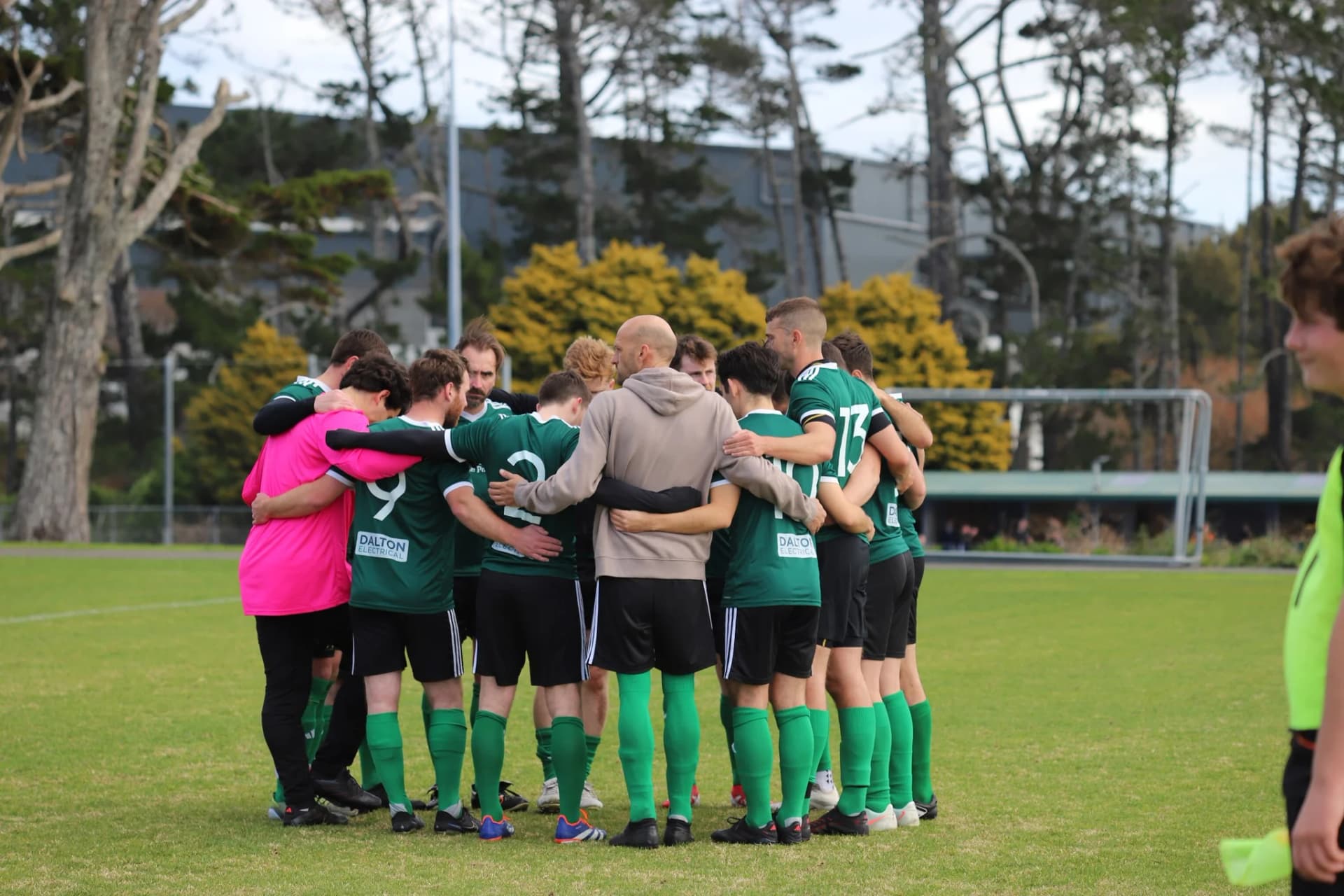 AFC Bohemian Celtic team huddle